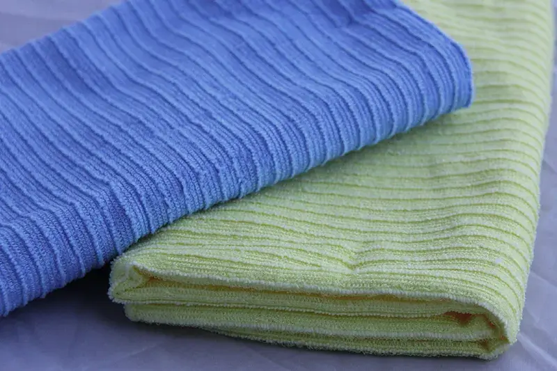 Microfiber fabric rolls in production